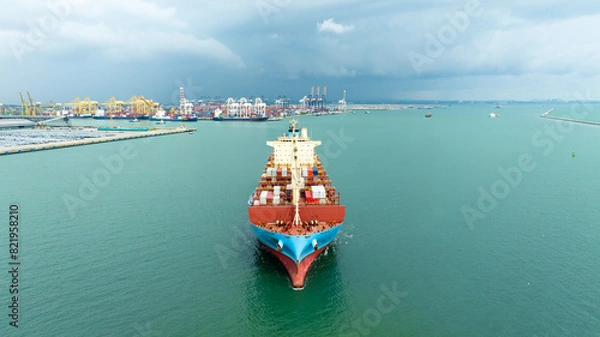 Fototapeta container ship sailing in sea, shipping business and industry service of cargo logistic import and export international freight transportation by container ship in open sea, aerial view