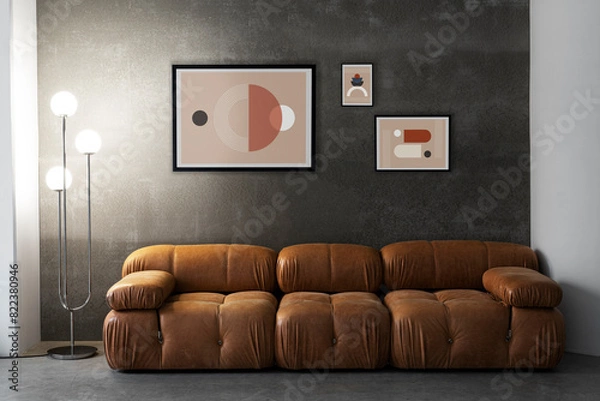 Obraz Interior design with photoframes and brown couch