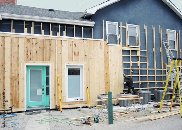 Obraz Installing new sidings on old house