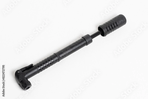Obraz Bike pump closeup white background, view from above.