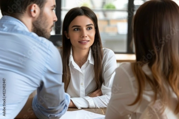 Fototapeta Professional hr recruiting company managers holding resume interviewing job applicant, employers recruiters listen seeker at interview make hiring decision at employment negotiation, staffing concept