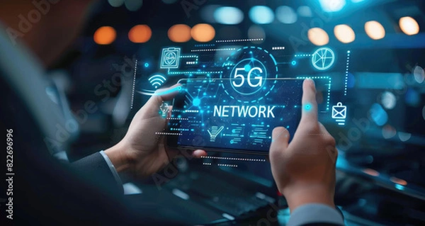 Fototapeta Businessman with 5G hologram on his hand and element of this image furnished, smart city and network connect concept