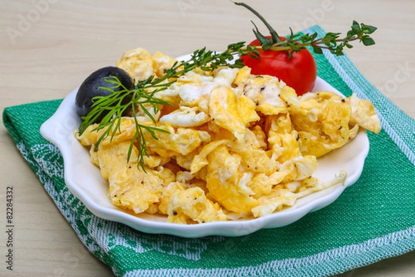 Fototapeta Scrambled eggs with tomato