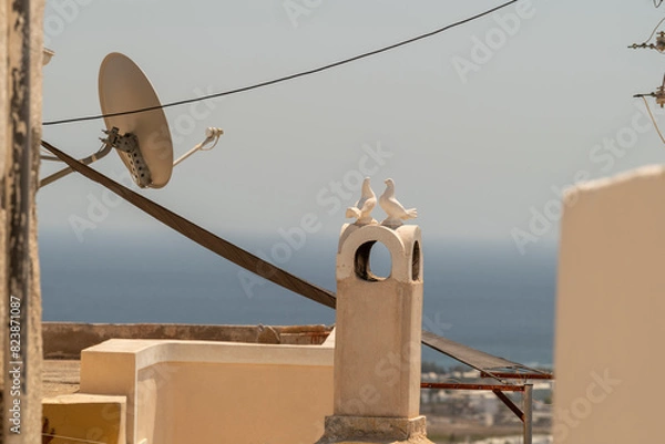 Obraz Dish antenna on the roof