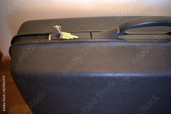 Fototapeta Old big suitcase with keys. 	
