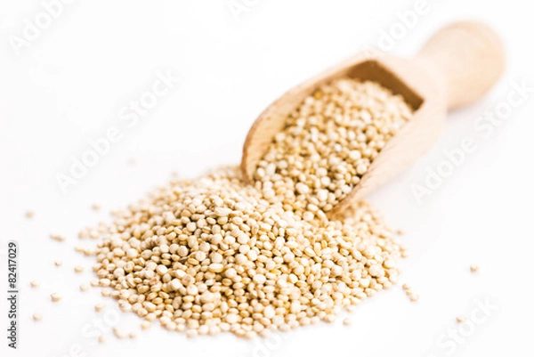 Fototapeta Pile of quinoa grain on a white background