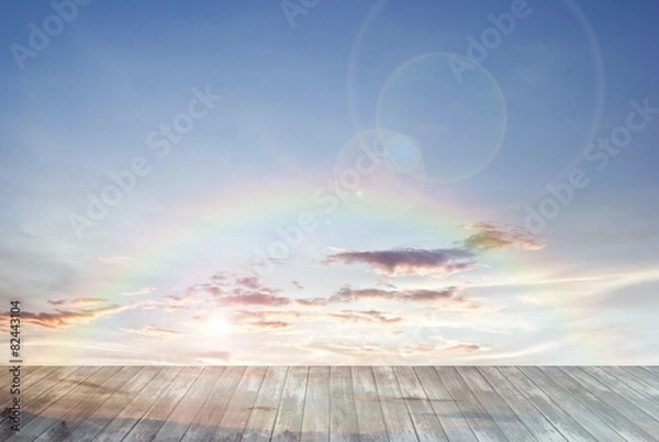 Fototapeta old wooden texture and rainbow with lens flare in blue sky