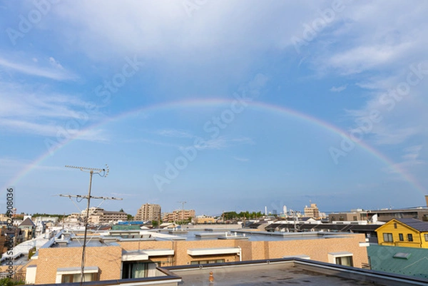 Fototapeta 街の中の虹