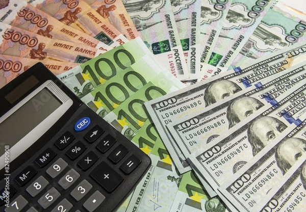 Obraz Калькулятор на фоне денег.