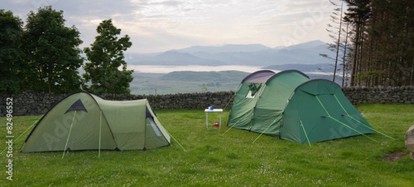 Obraz Tents with view over estuary to Snowdonia mountains Wales, UK. 