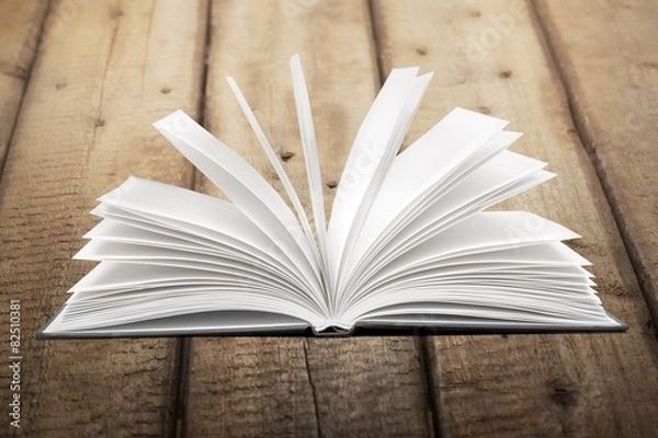 Fototapeta Art. Image of opened magic book with magic lights