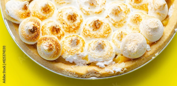 Fototapeta Lemon Meringue Pie, butter enriched shortcrust pastry filled with creamy lemon and topped with meringue