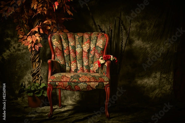 Fototapeta Antique Empty Chair with Colorful Pattern and Plant.