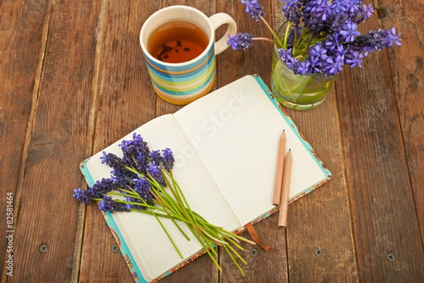 Obraz Notebook on a wooden table