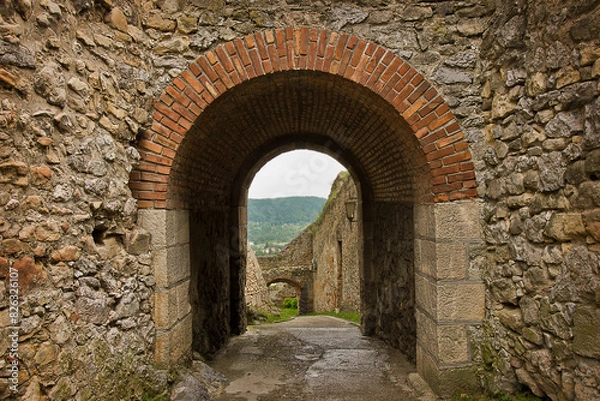 Fototapeta ancient Trencin Castle in Slovakia 11th century. A wall with an archway.