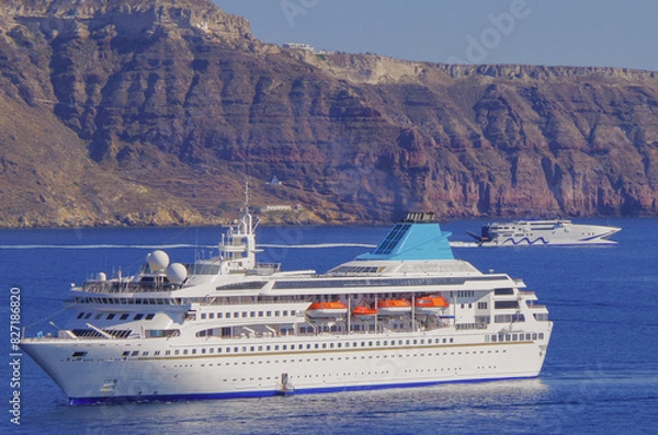 Fototapeta Dream holiday vacation to Greek Island Santorini during Summer Mediterranean Aegean cruising on Celestyal breathtaking nature landscape scenery