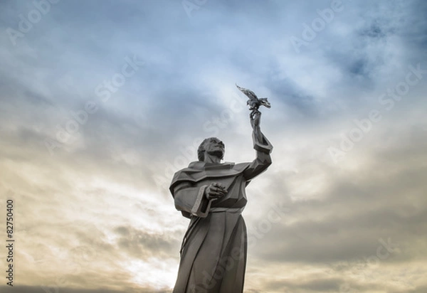 Fototapeta Saint Francis statue holding a dove