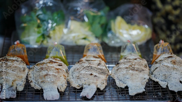 Fototapeta Food from the market is sold on the streets where people pass by. It is easy to buy and the price is cheap.