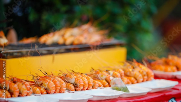 Fototapeta Food from the market is sold on the streets where people pass by. It is easy to buy and the price is cheap.