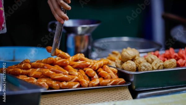 Fototapeta Food from the market is sold on the streets where people pass by. It is easy to buy and the price is cheap.