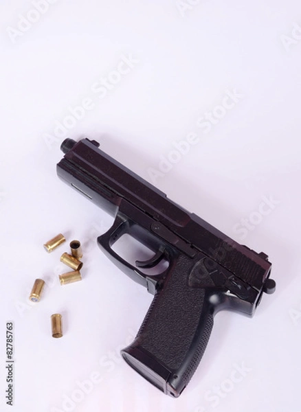 Fototapeta gun and bullets
