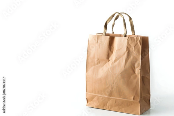 Fototapeta Brown paper bag isolated on white background with copy space for text.