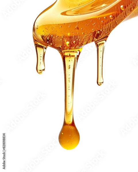 Obraz A drop of honey drips down a spoon on a Transparent Background.