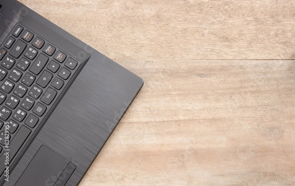 Obraz black notebook on wooden .