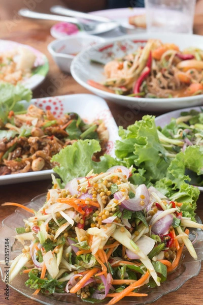Fototapeta Herb salad with deep fried fish and shrimp (Thai fusion  food)
