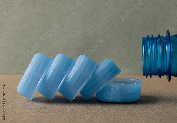 Obraz Plastic caps for plastic bottles. Plastic raw materials.