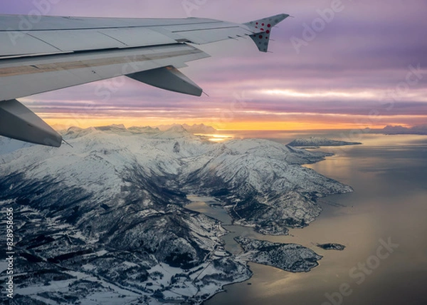 Obraz wing of an airplane during flight