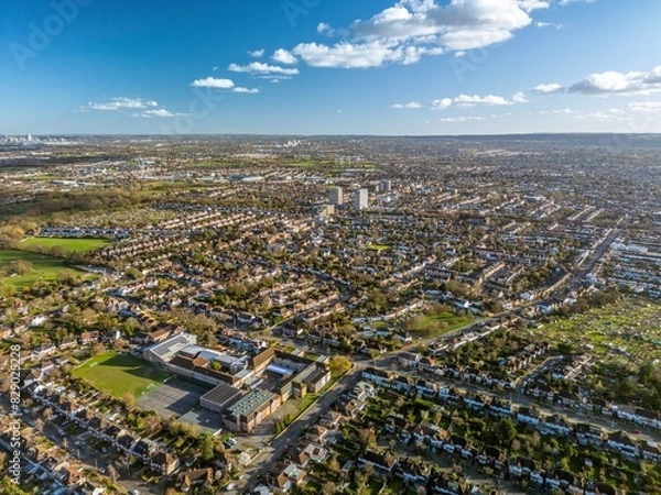 Fototapeta The drone aerial view of New Malden.  New Malden is an area in South West London, England. It is located within the Royal Borough of Kingston upon Thames and the London Borough of Merton.
