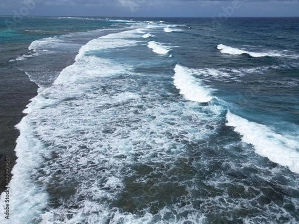 Fototapeta Aerial view with high view of the reef break in san andres island Colombia
