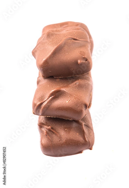 Fototapeta Toffee candy over white background