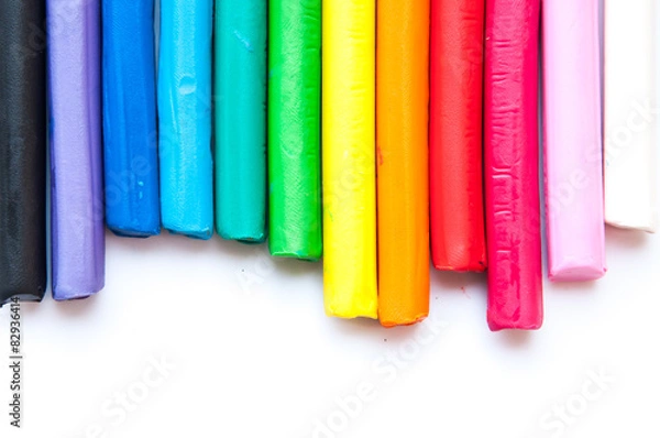 Fototapeta Rainbow colors plasticine play dough modeling clay isolated over