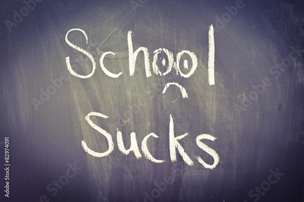 Obraz School Sucks, written in chalk on a blackboard