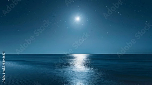 Fototapeta A photographic style of a sky and sea environment, clear night sky with bright stars and a full moon over a serene sea. The moonlight creates a shimmering path on the water's surface. Deep blue tones