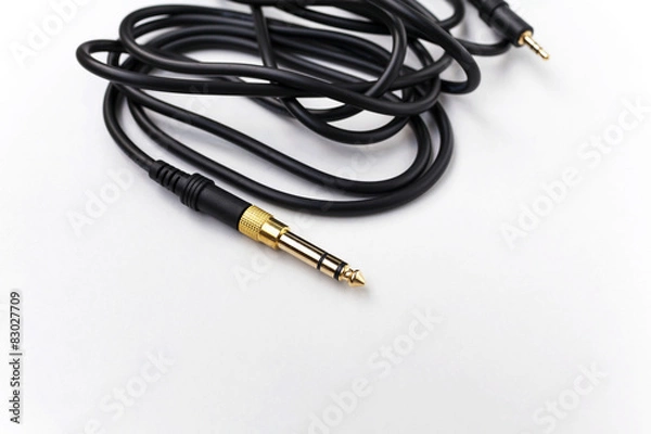 Obraz Closeup black audio cable background selective focus