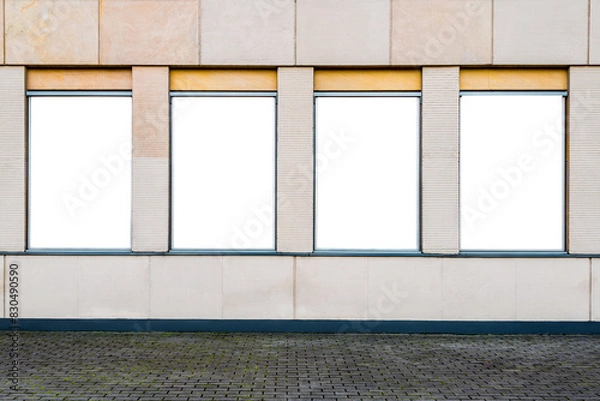 Fototapeta Four Blank Vertical Mockups Of Poster Light Boxes On A Building Wall. Front View