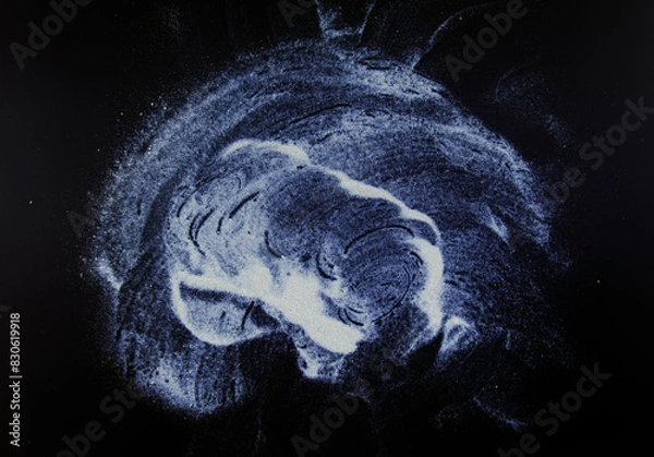 Obraz abstract white dust on a black background.
