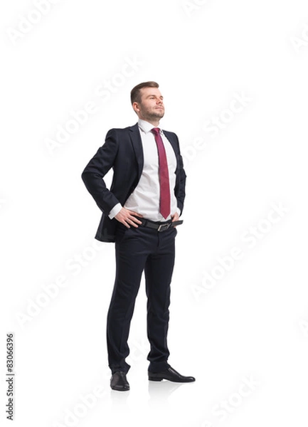 Fototapeta Confident handsome businessman is going to tackle with problems.