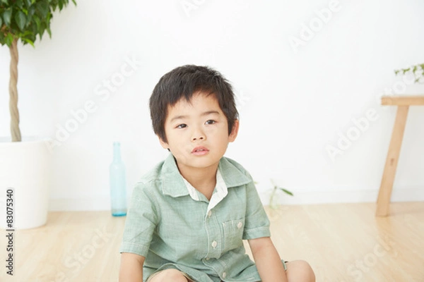 Fototapeta 眠そうな男の子