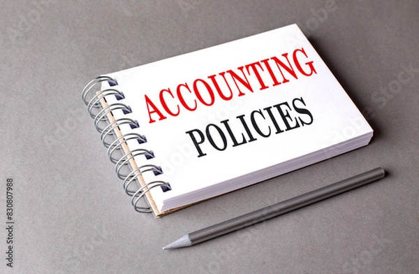 Fototapeta ACCOUNTING POLICIES text on notebook on grey background