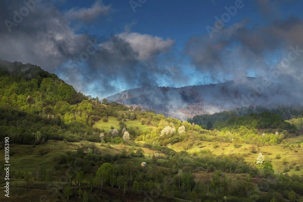 Fototapeta Sunset over spring hills 