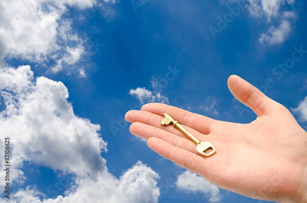 Obraz hand with a key in the sky