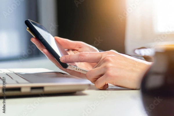 Fototapeta close up of a person using a laptop