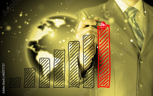 Fototapeta Business man drawing a growing graph