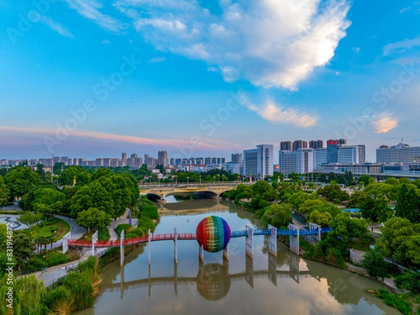Fototapeta Huaian, Jiangsu Province: China's North-South boundary symbol park in the morning light