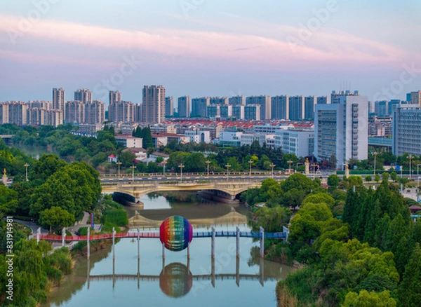 Fototapeta Huaian, Jiangsu Province: China's North-South boundary symbol park in the morning light