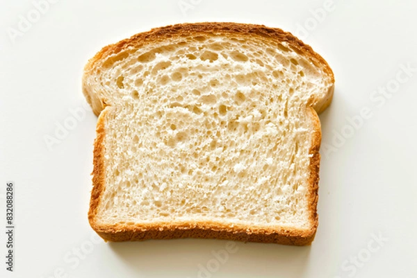 Fototapeta a slice of bread with a bite taken out of it